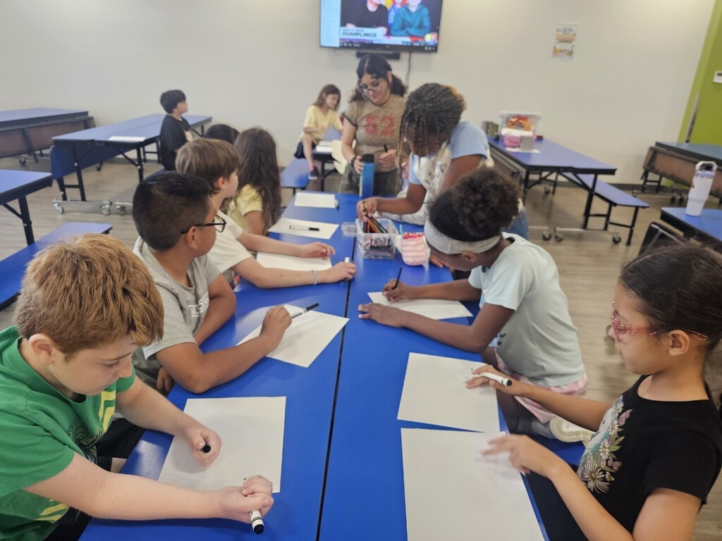 students drawing during summer camp