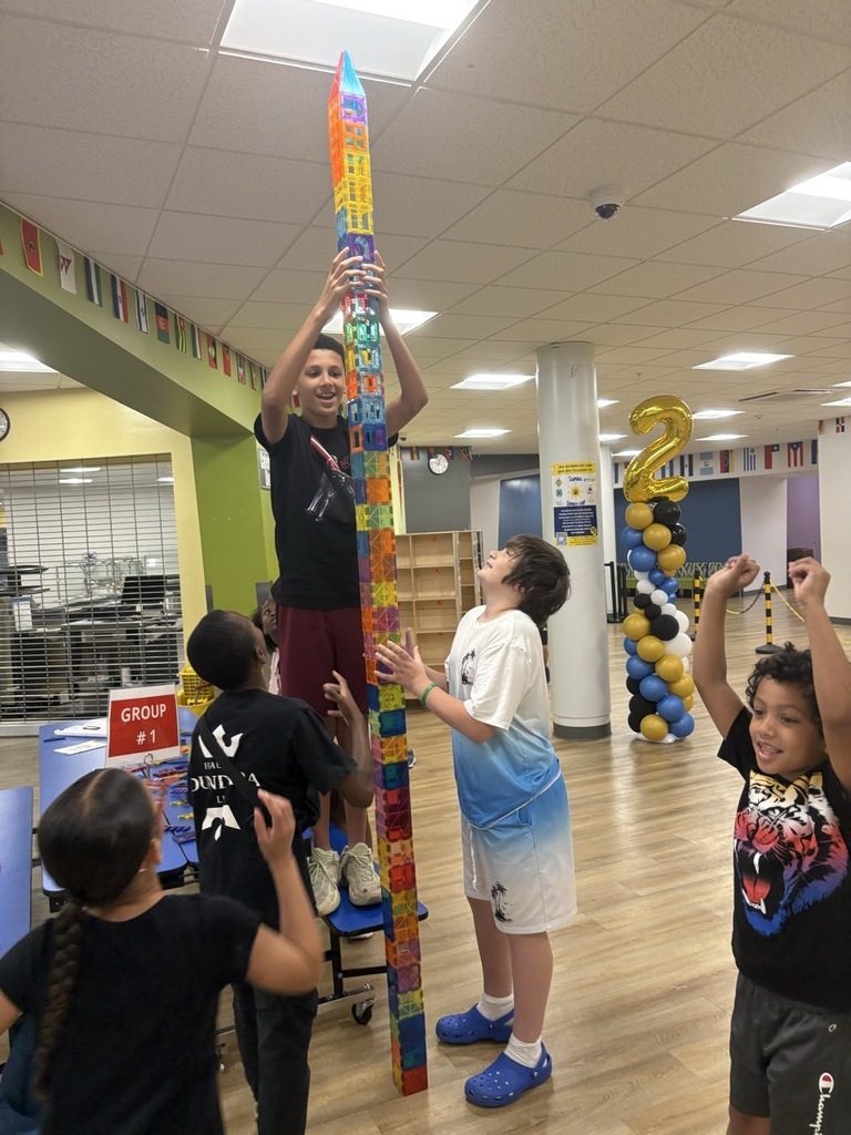 students building a huge lego tower
