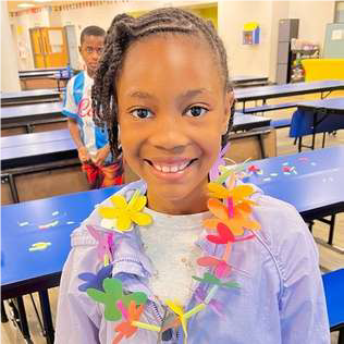girl with Hawaiian flower necklace