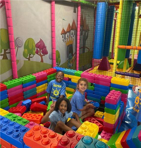 kids playing with large lego blocks