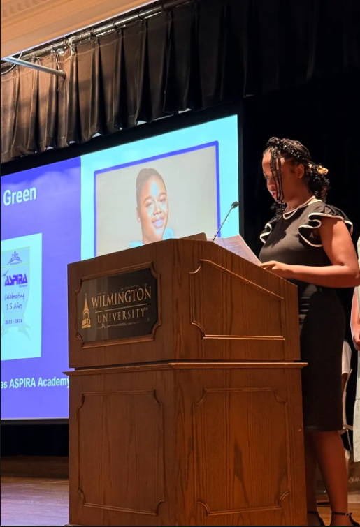 Aliyah speaking at podium at AVID event