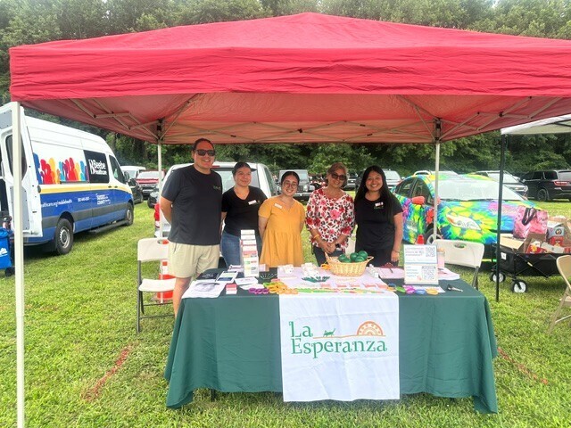 La Esperanza tabling at event