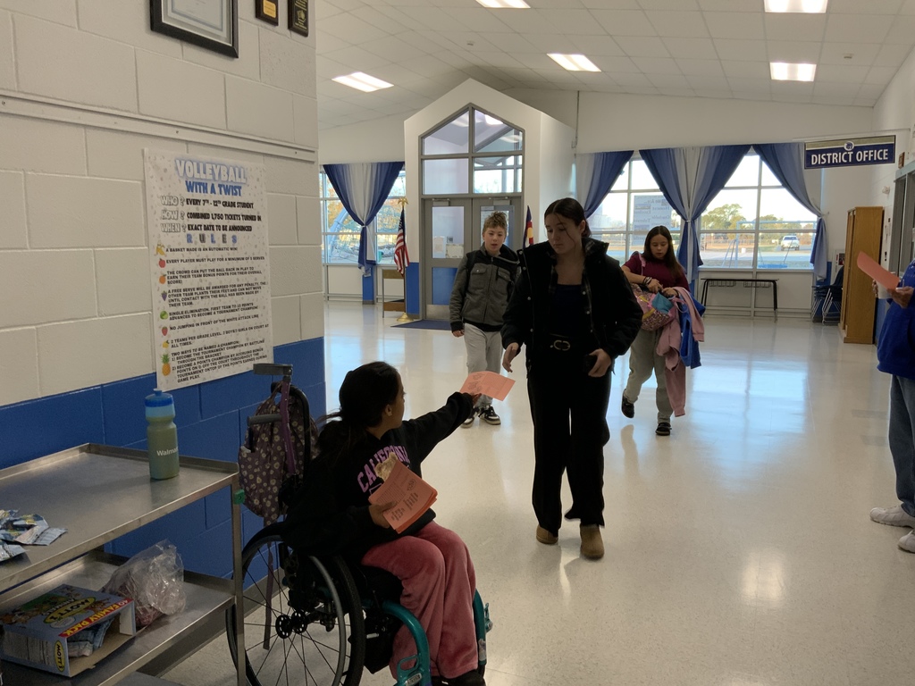 Pure gold members handing out treats 