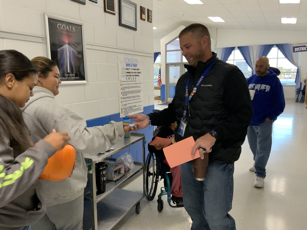 Pure gold members handing out treats