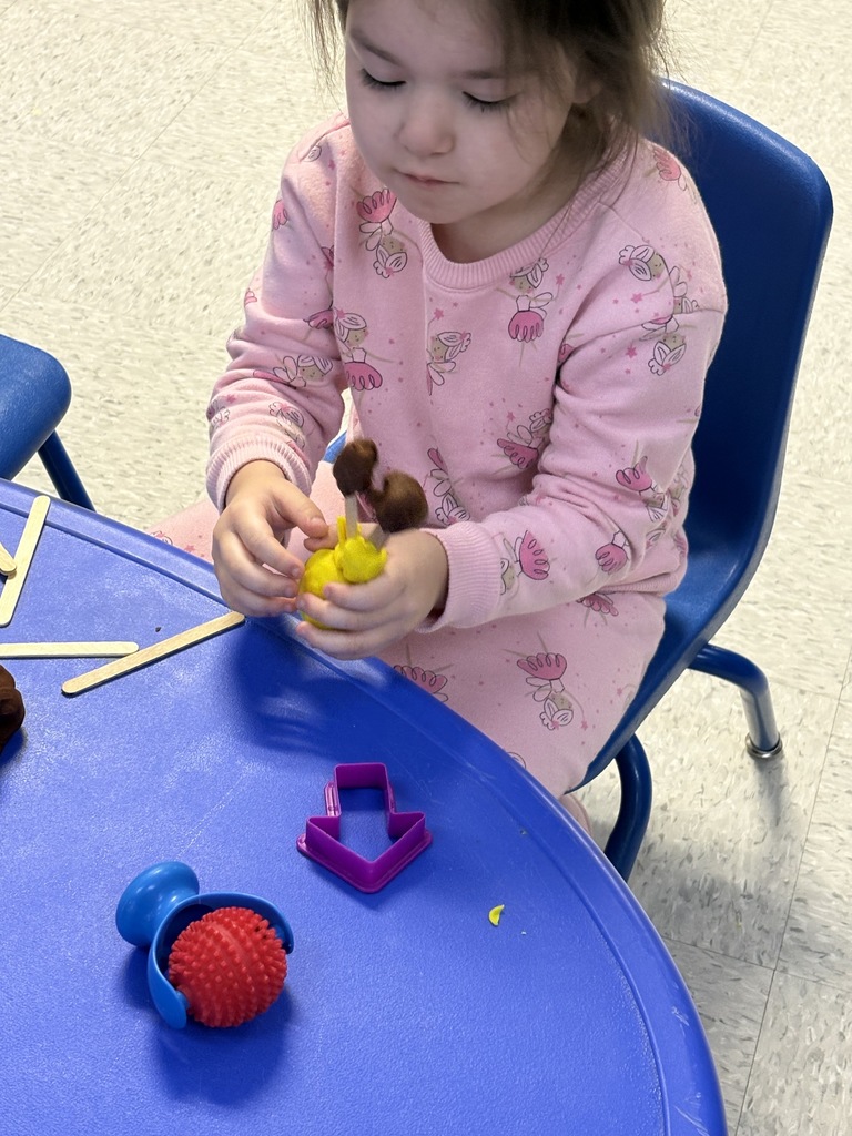 Mixed aged daycare play doh projects