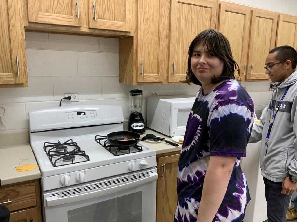 Food science class making hamburgers