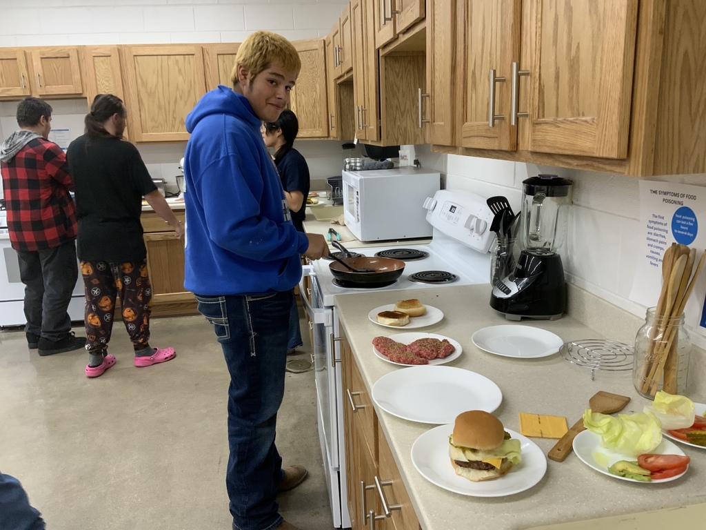 Food science class making hamburgers