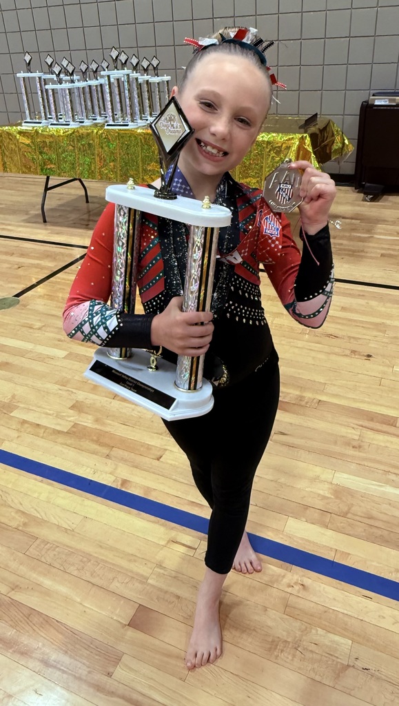 Pictures of 2nd grader at gymnastic competition 