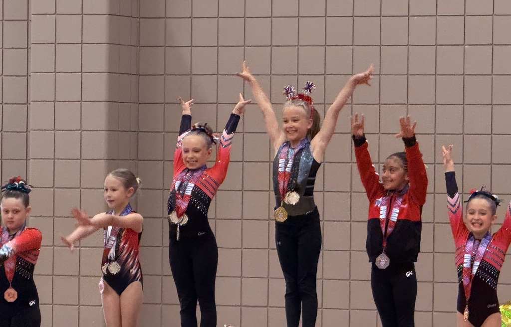 Pictures of 2nd grader at gymnastic competition 