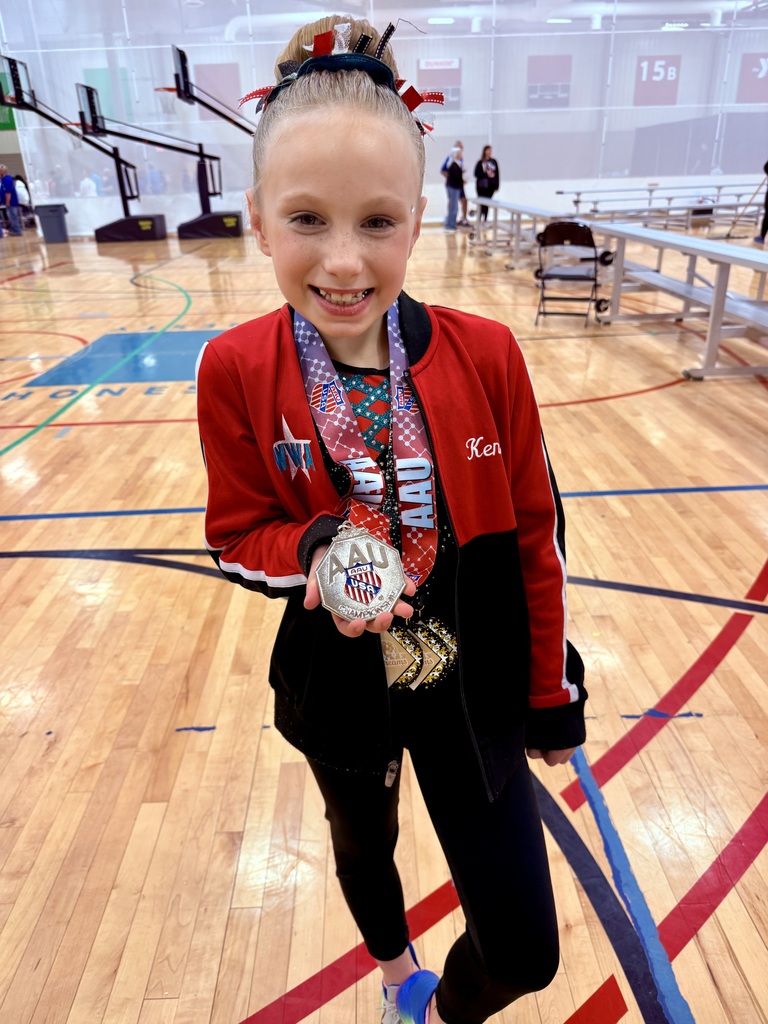 Pictures of 2nd grader at gymnastic competition 