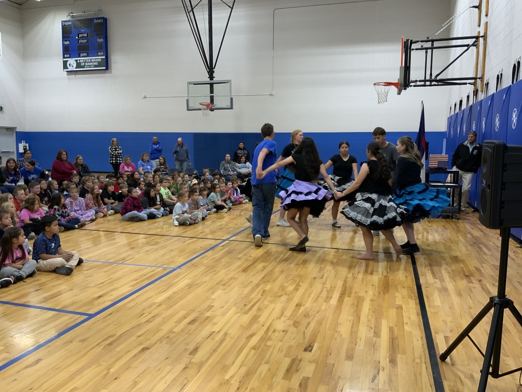 HS Square dancers at elementary assembly 
