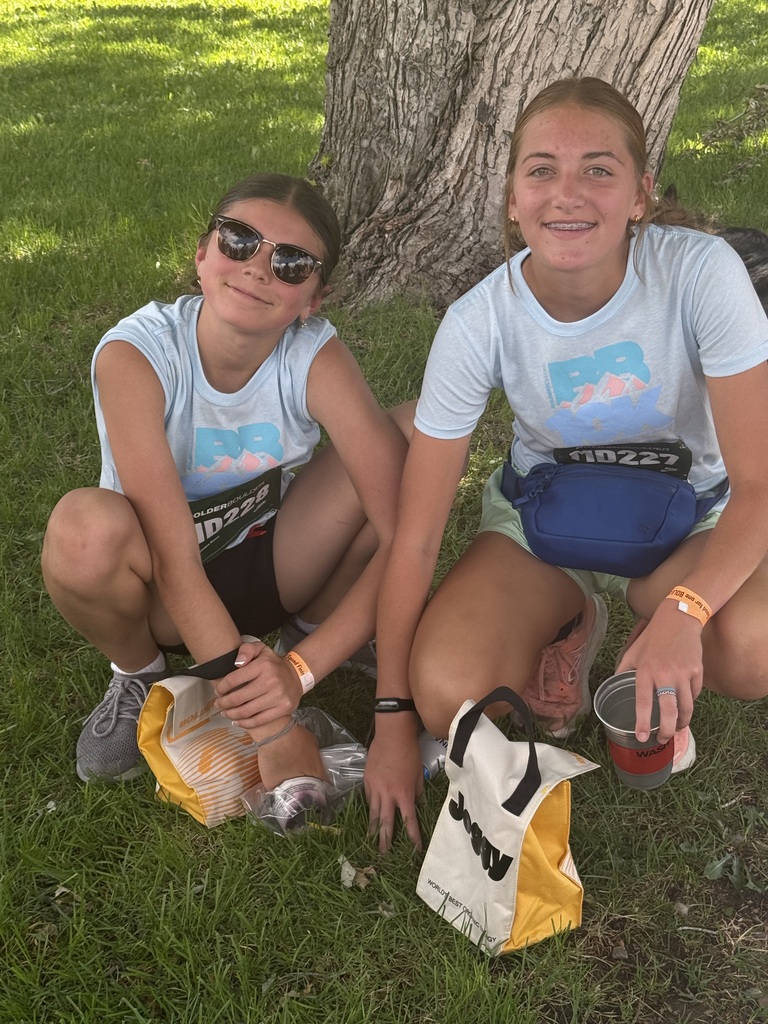 Students running the Boulder Boulder