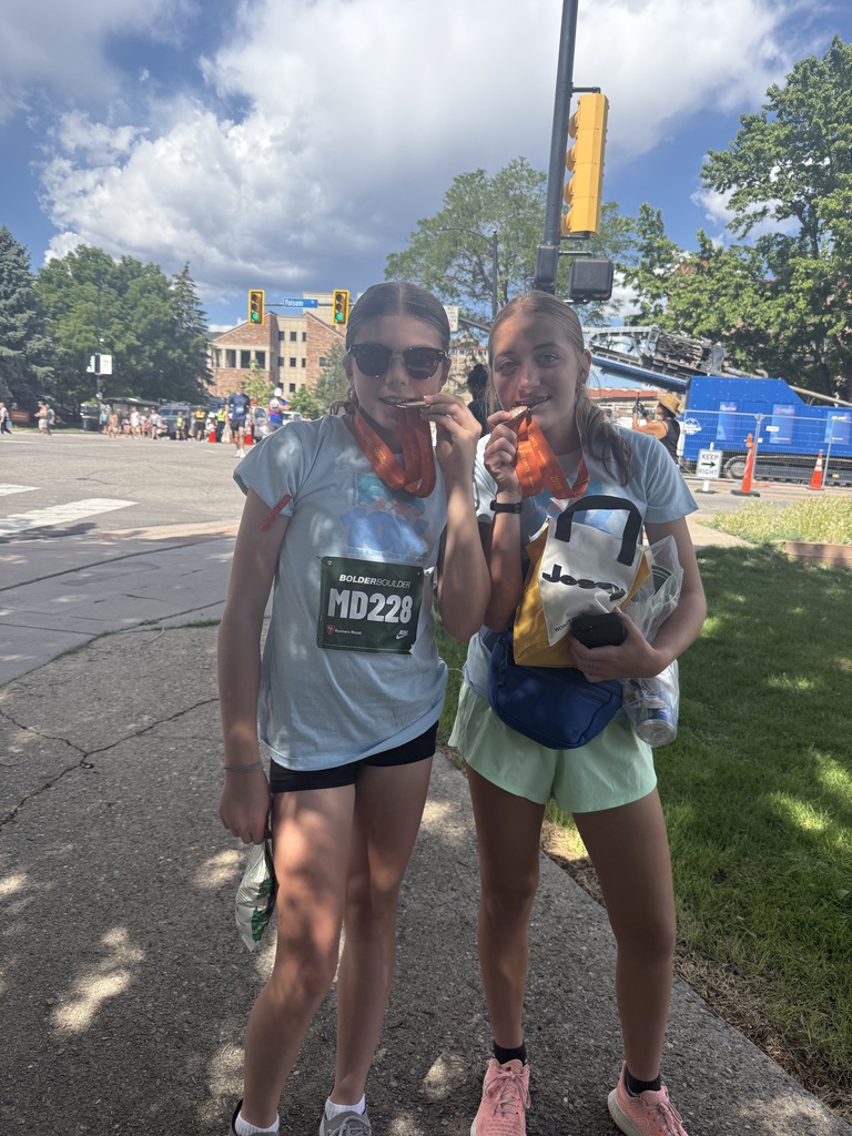 Students running the Boulder Boulder