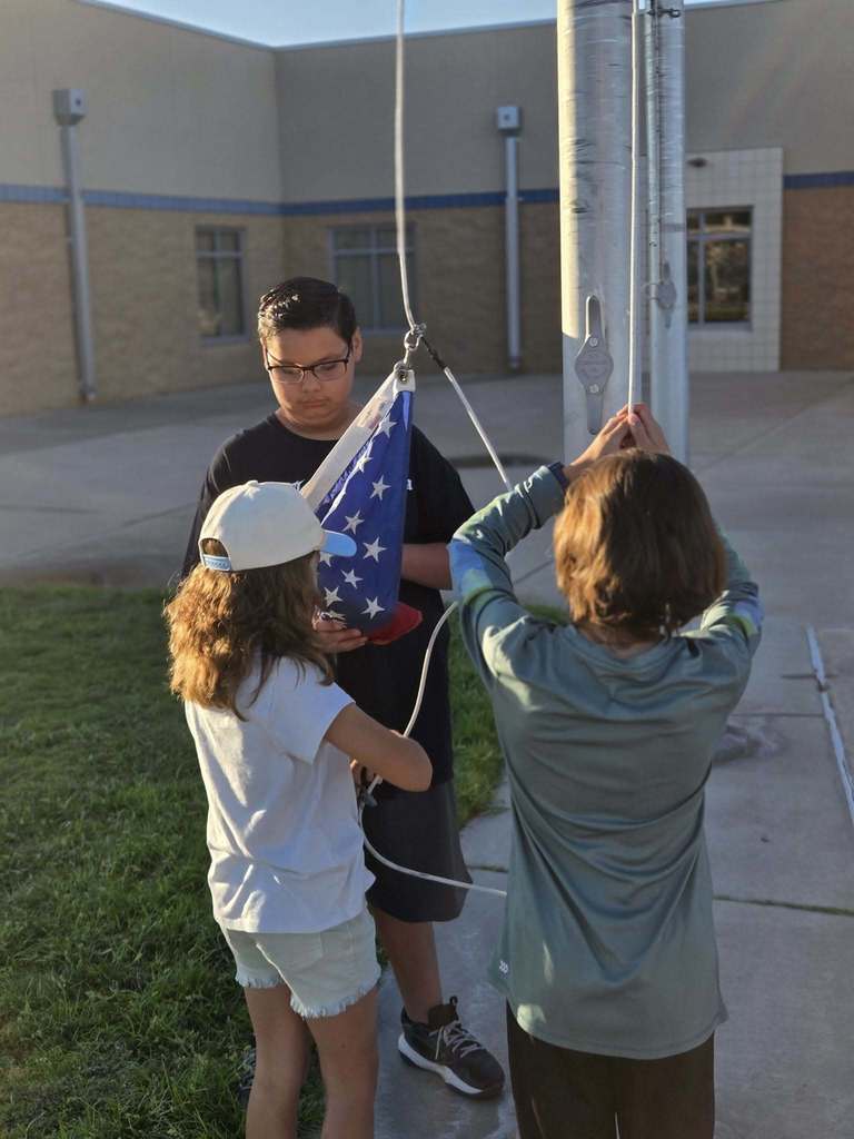 Post 10 Commander Theron Imlay and Sons of The American Legion Squadron 10 Commander William Wight joined the Extreme Team at Loma Heights Elementary this morning to assist with raising the flags to half-staff in remembrance of September 11.