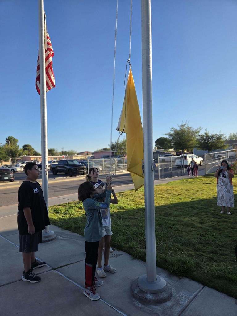 Post 10 Commander Theron Imlay and Sons of The American Legion Squadron 10 Commander William Wight joined the Extreme Team at Loma Heights Elementary this morning to assist with raising the flags to half-staff in remembrance of September 11.