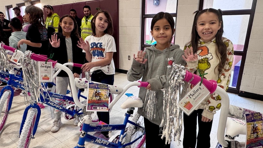 Holiday Cheer Rolls Through LCPS with Bicycle Giveaway | Las
