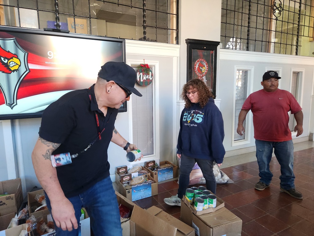 Staff filling holiday boxes