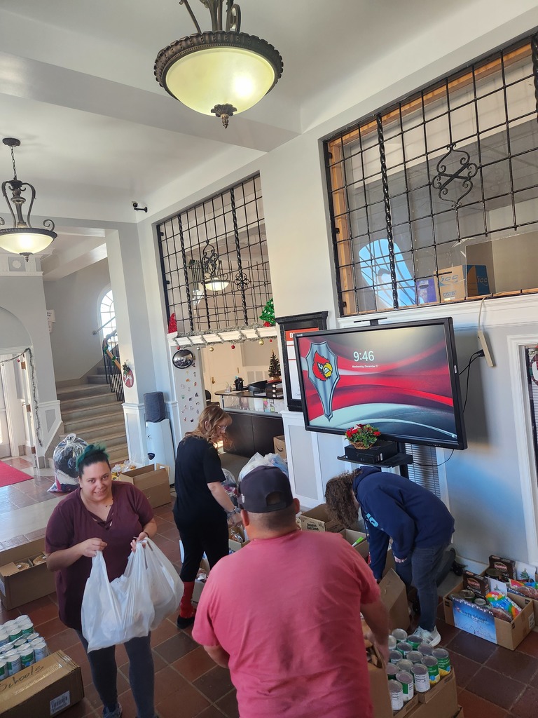 Staff filling holiday boxes
