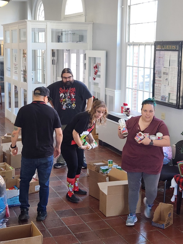 Staff filling holiday boxes