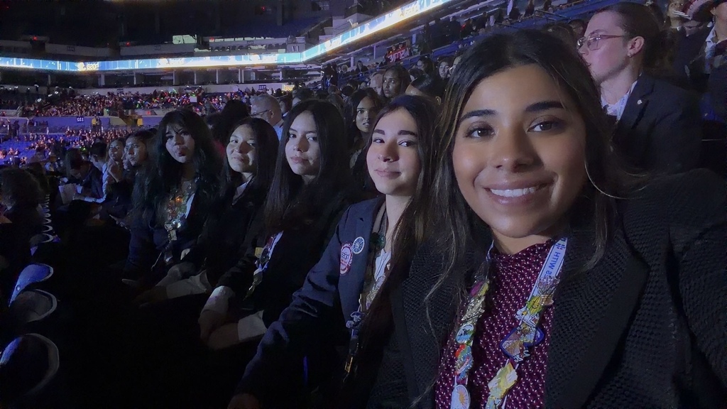 teacher and students smiling