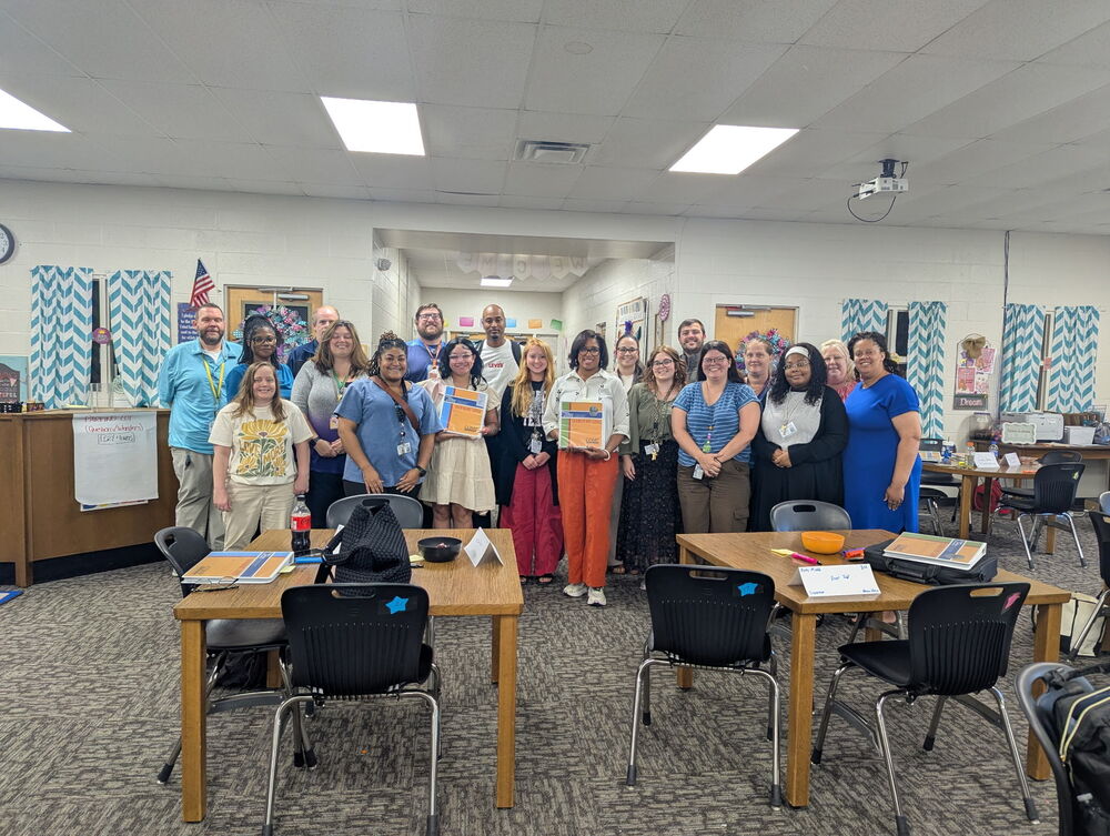 A group of educators who completed the two-day COMP training at RES.