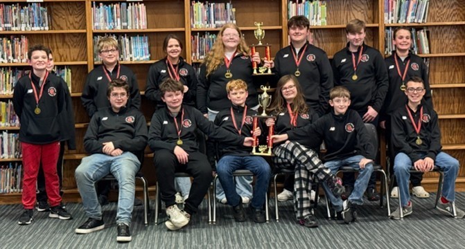 SLMS academic team posing with Cardinal Classic trophies and medals