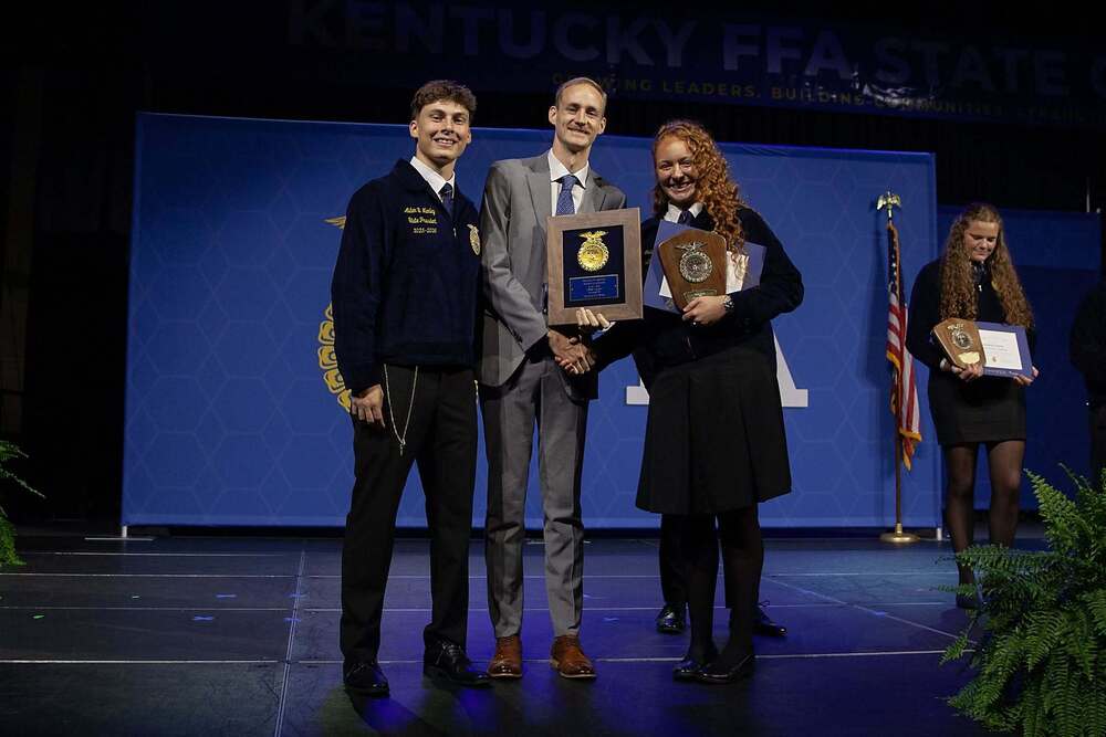 Image of Mallie Johnson receiving her award