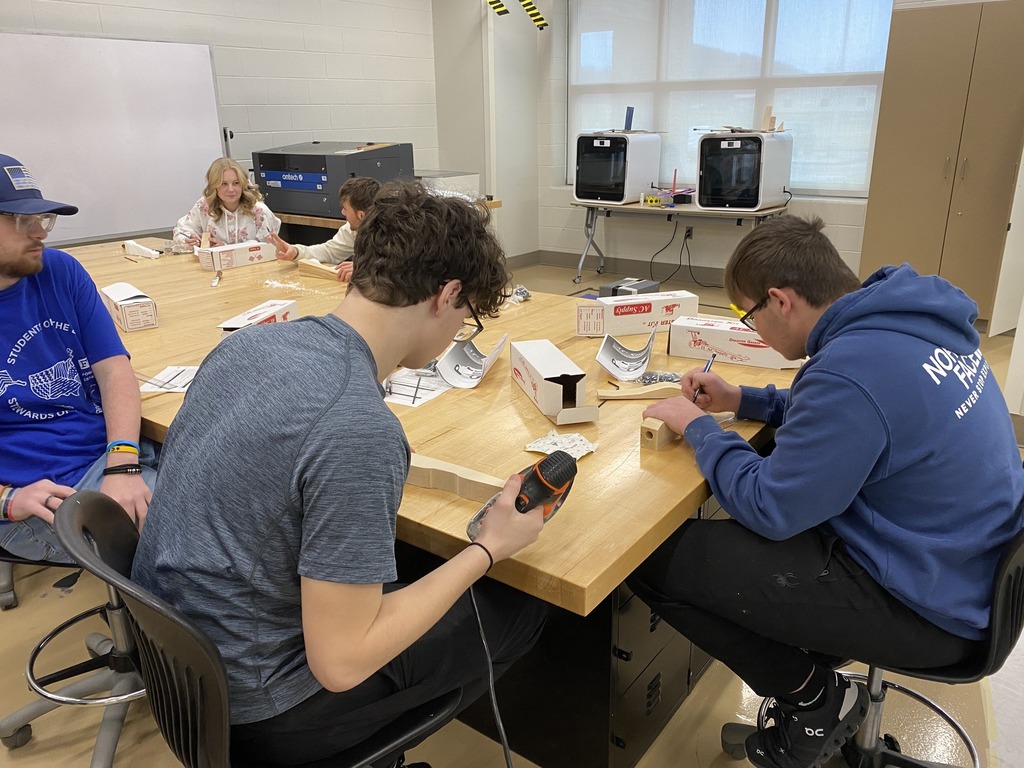 Students working on designing dragsters
