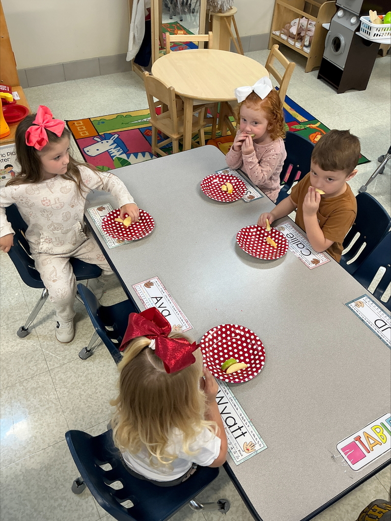 Students eating apples
