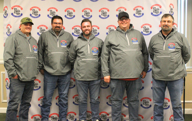 Board members posed with  their new pullover jackets with LCPS logo
