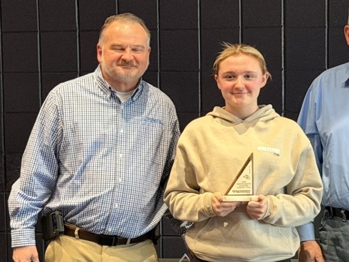 Lillie Queen poses with trophy