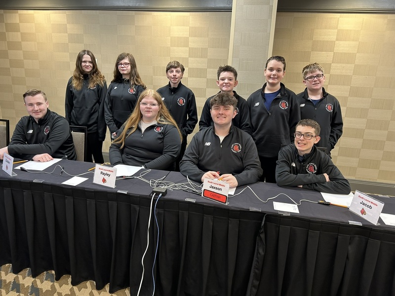 quick recall team posing before state finals match