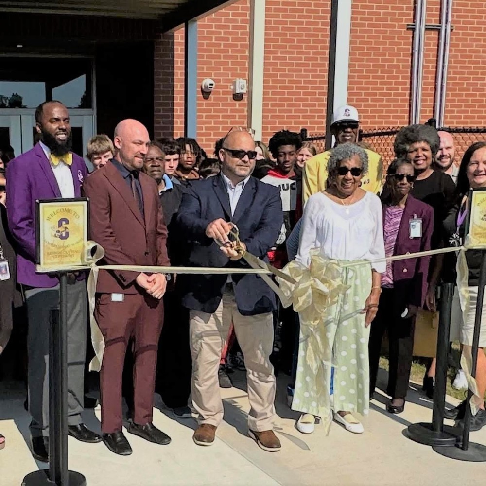 Color photo of ribbon cutting 