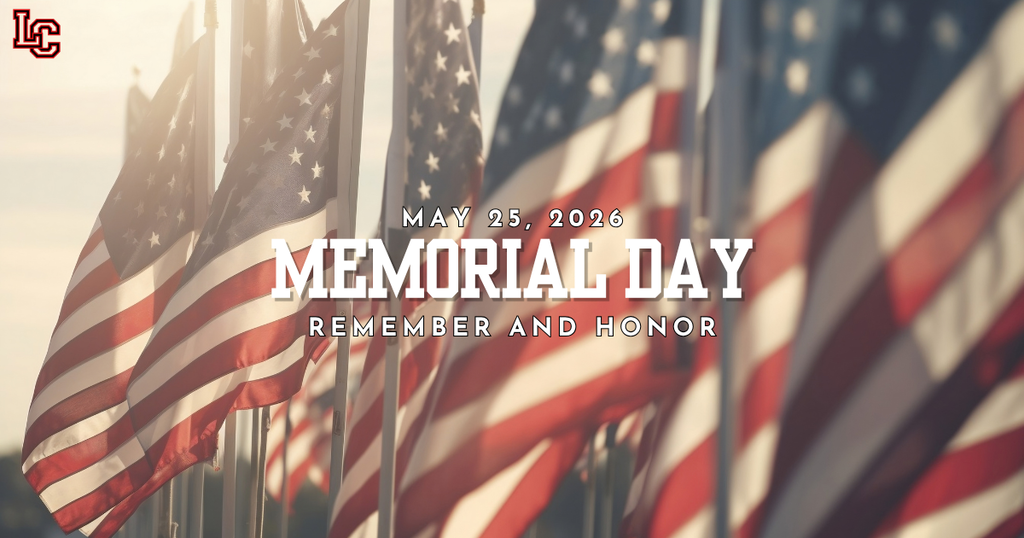 Flags lined up with Memorial Day text in the middle. Flags have red, white, and blue colors.