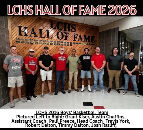 Nine men in red, black, and green shirts pose in front of a "LCHS HALL OF FAME" sign.