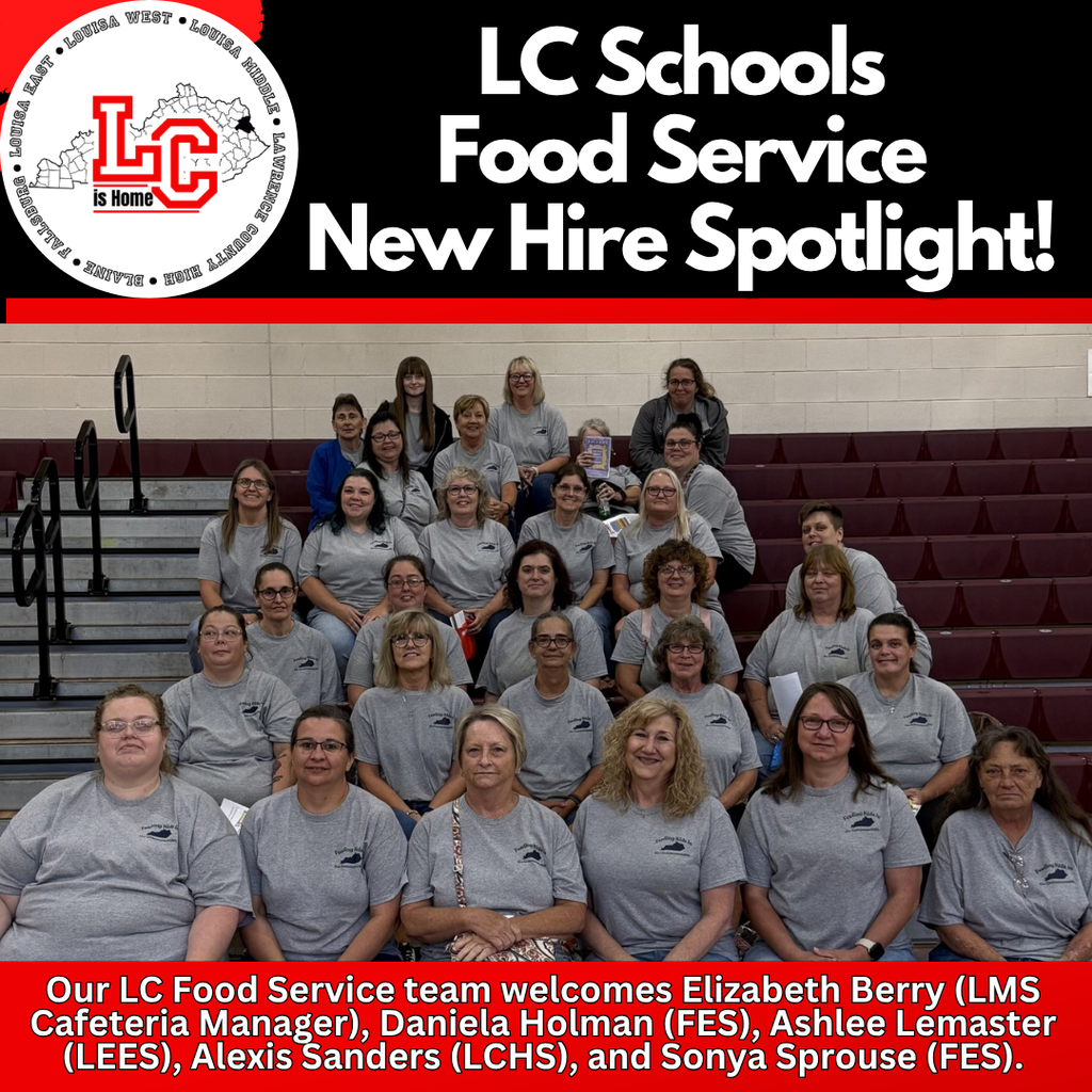 A group of women wearing gray shirts pose on stairs in a stadium, highlighting new hires.