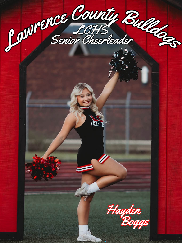 A cheerleader in a red frame holds red and black pompoms, wearing a black uniform with white trim, white socks and white shoes.