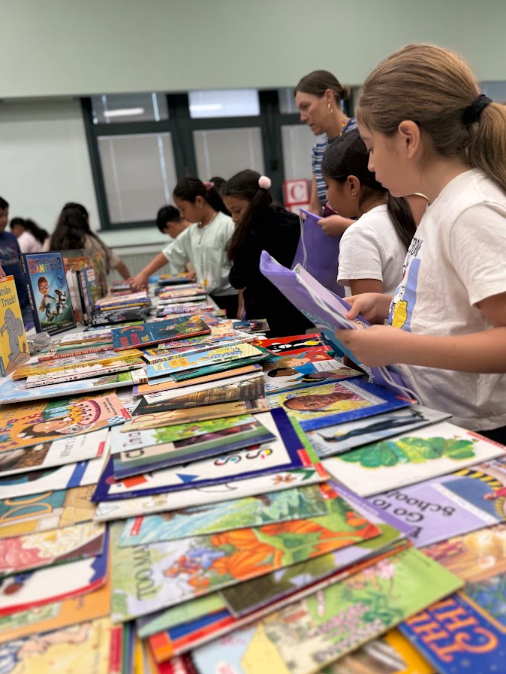 Students filling book bags