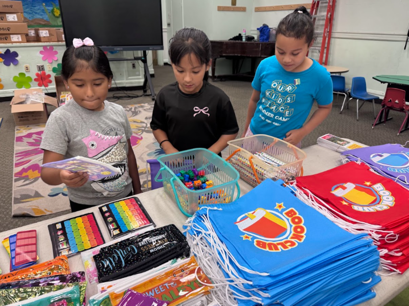 Students filling book bags