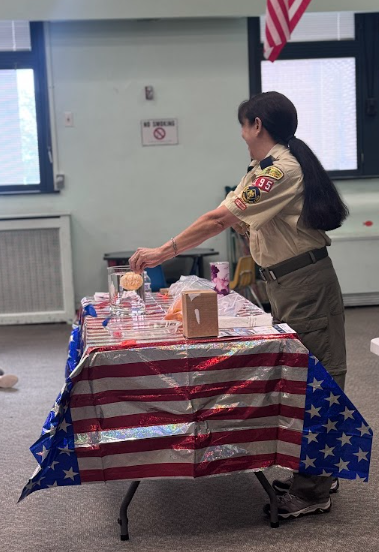 Ms. Pam conducting an experiment
