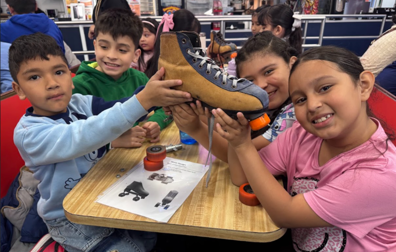 Ms. Perez's students taking apart a roller skate