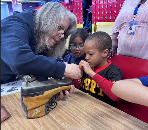 Ms. Pappas' students taking apart a roller skate