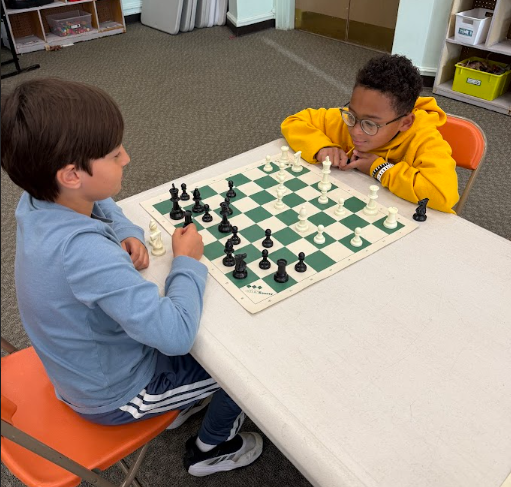 Two students playing chess