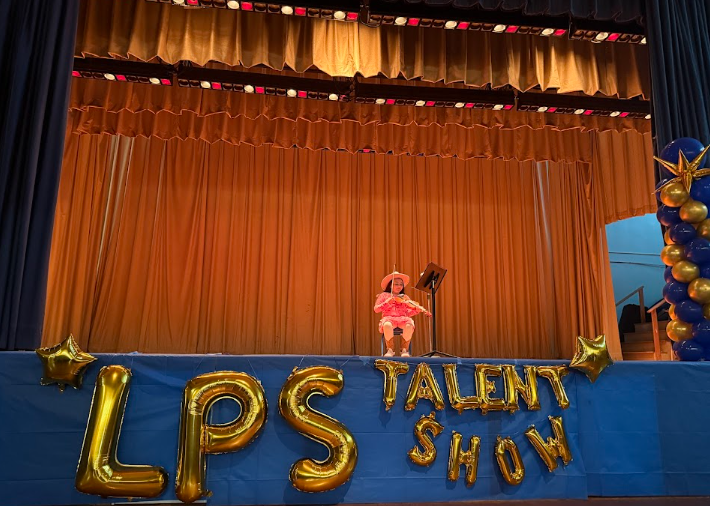 Frescia performing on the violin