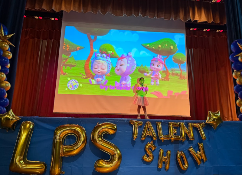 Alicia singing and dancing