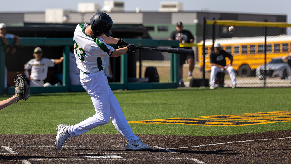 MHS Baseball Player Hitting