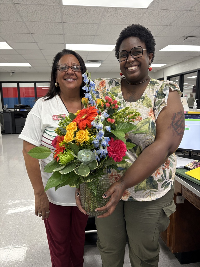Secretaries share Scott's House of Flowers donation