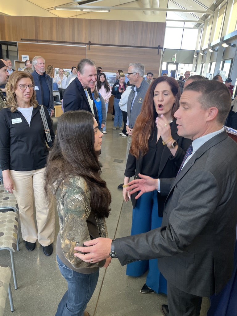 LHS student Lexy speaks with CA State Senator Mike McGuire and Lisa Wittke Schaffner of the North Coast Builders Exchange