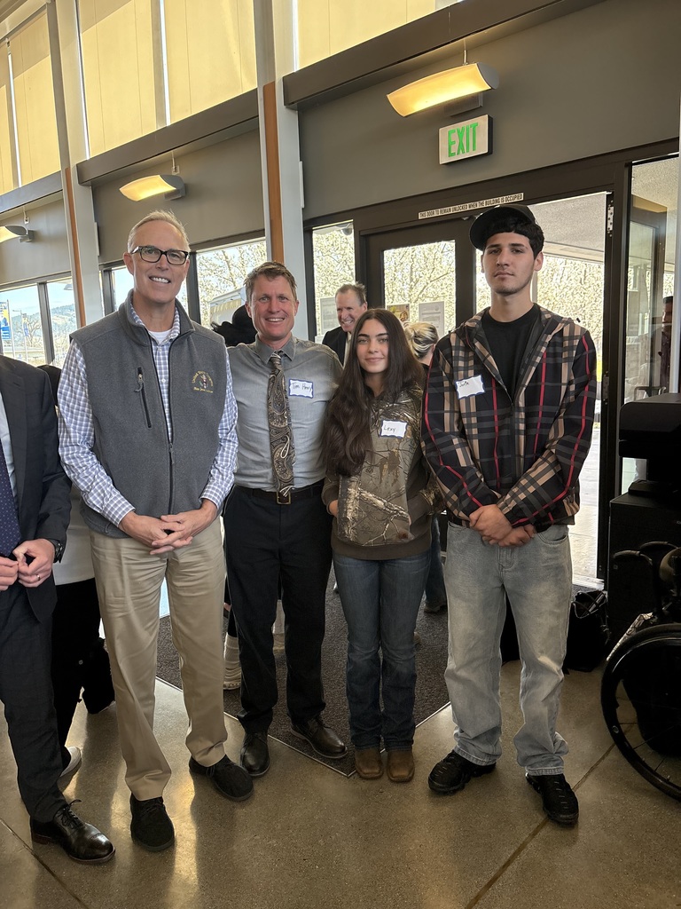 Congressman Jared Huffman poses with Principal Tim Henry and LHS students Lexy and Jorge
