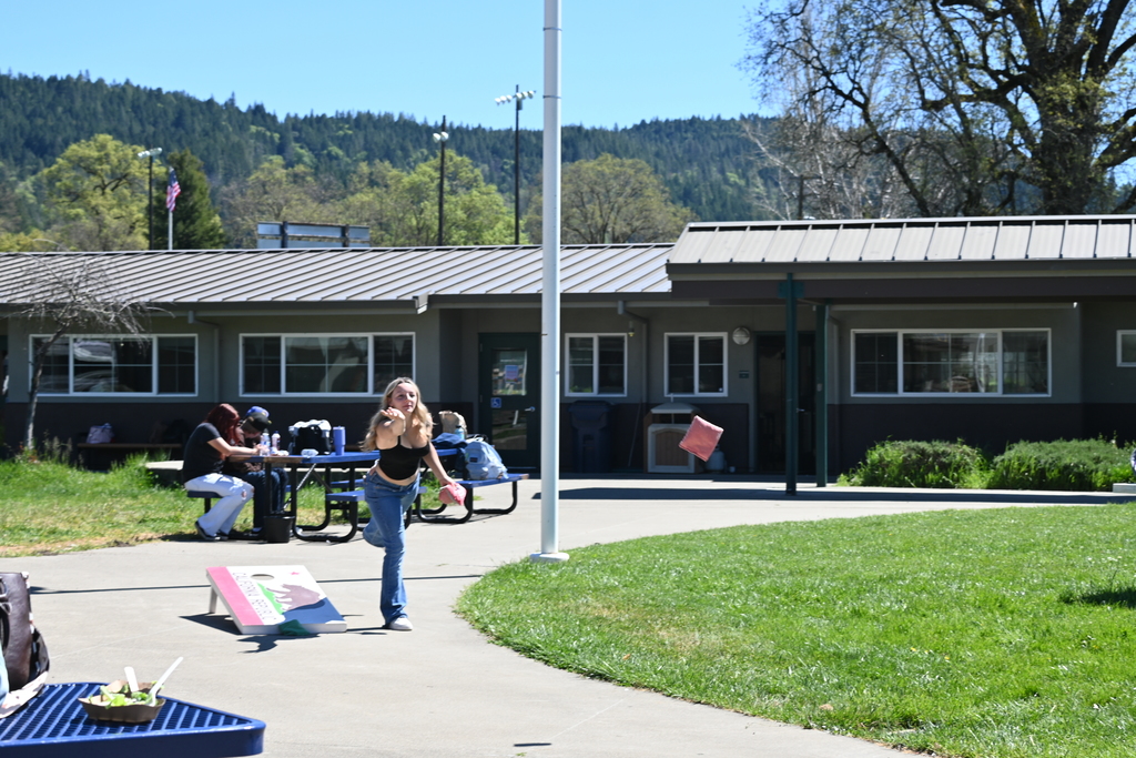 Student plays corn hole